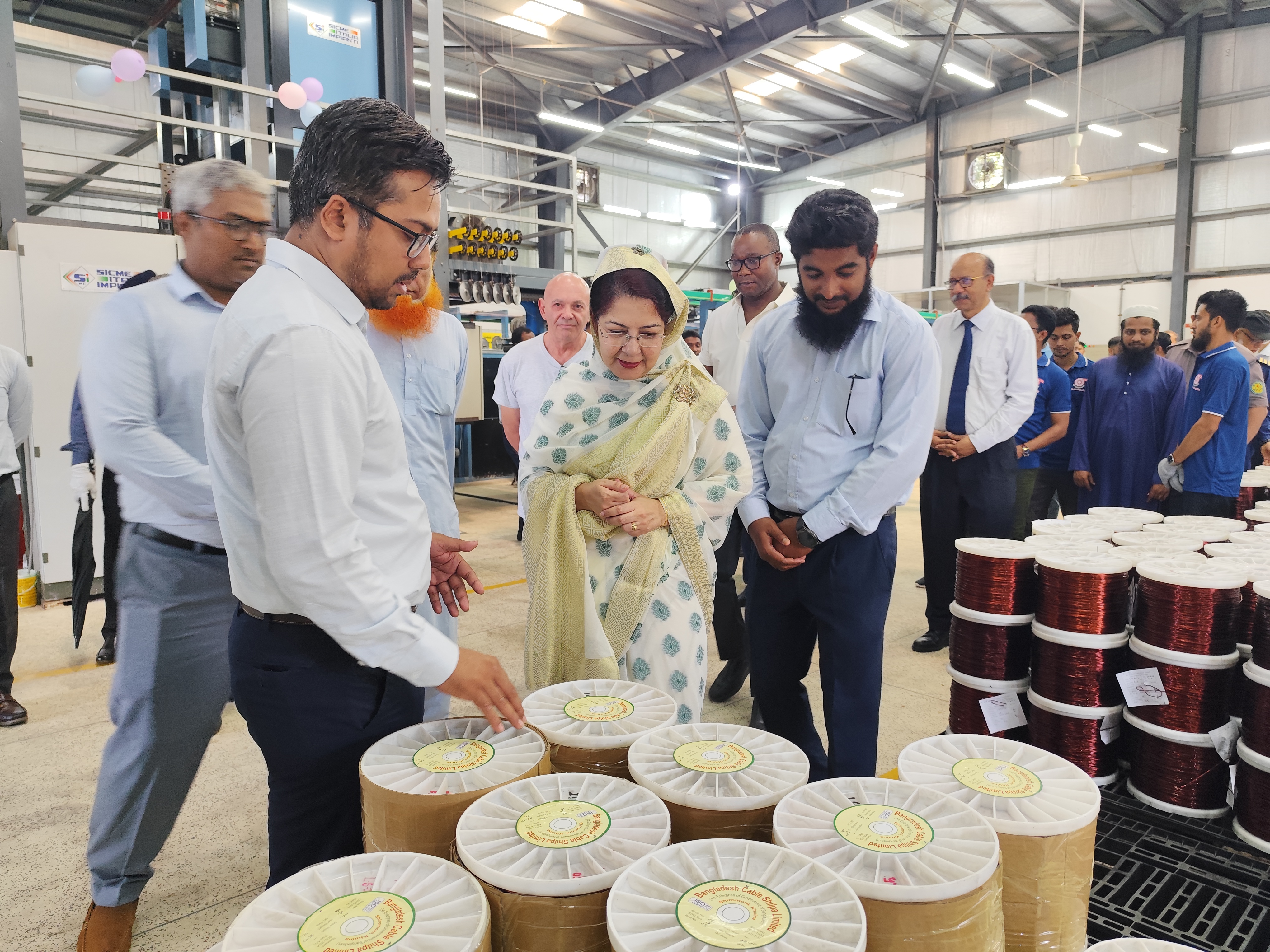 উদ্বোধন-পরবর্তী সুপার এনামেল্ড কপার ওয়্যার উৎপাদন প্লান্টের কার্যক্রম পরিদর্শন করেন গণপ্রজাতন্ত্রী বাংলাদেশ সরকারের ডাক ও টেলিযোগাযোগ বিভাগের সচিব এবং বাংলাদেশ ক্যাবল শিল্প লিমিটেড (BCSL) পরিচালনা পরিষদের চেয়ারম্যান জনাব মিজ বিলকিস জাহান রিমি।
