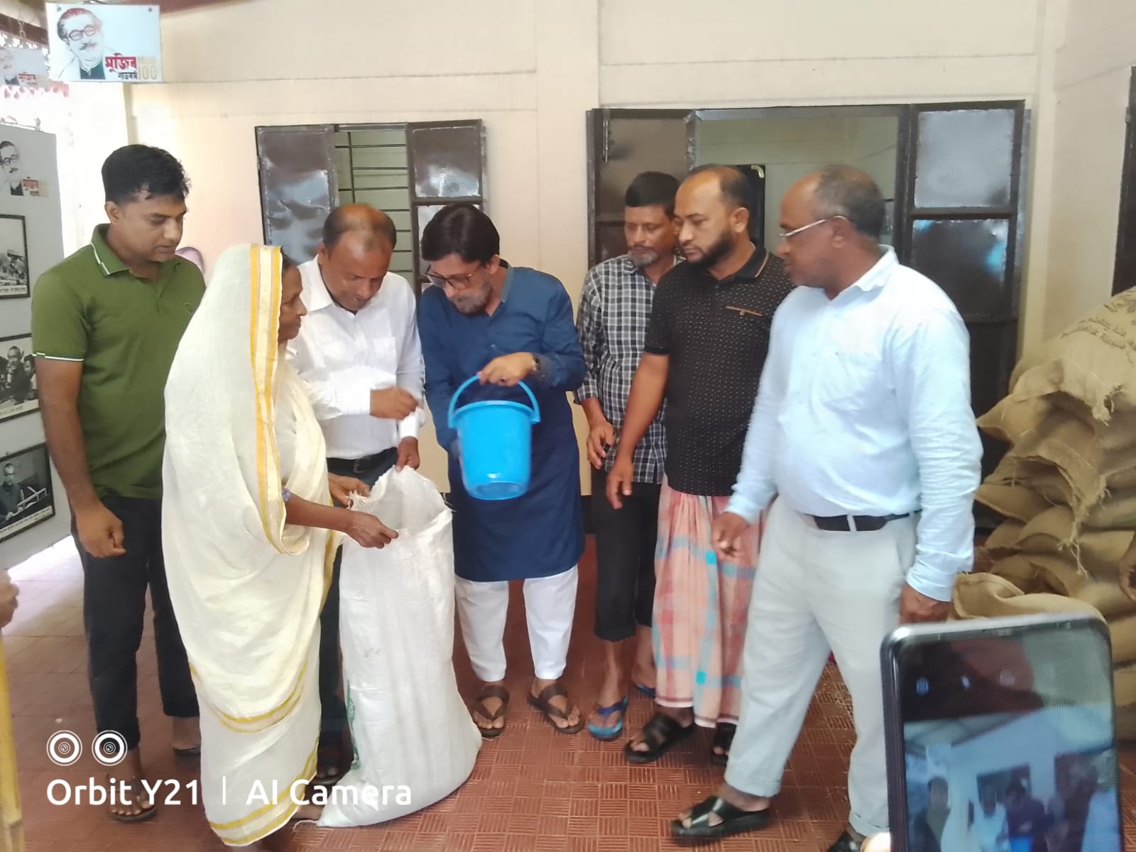 ২০২৪ ইং বন্যার ক্ষতিগ্রস্তদের মাঝে জি আর চাল বিতরণ।